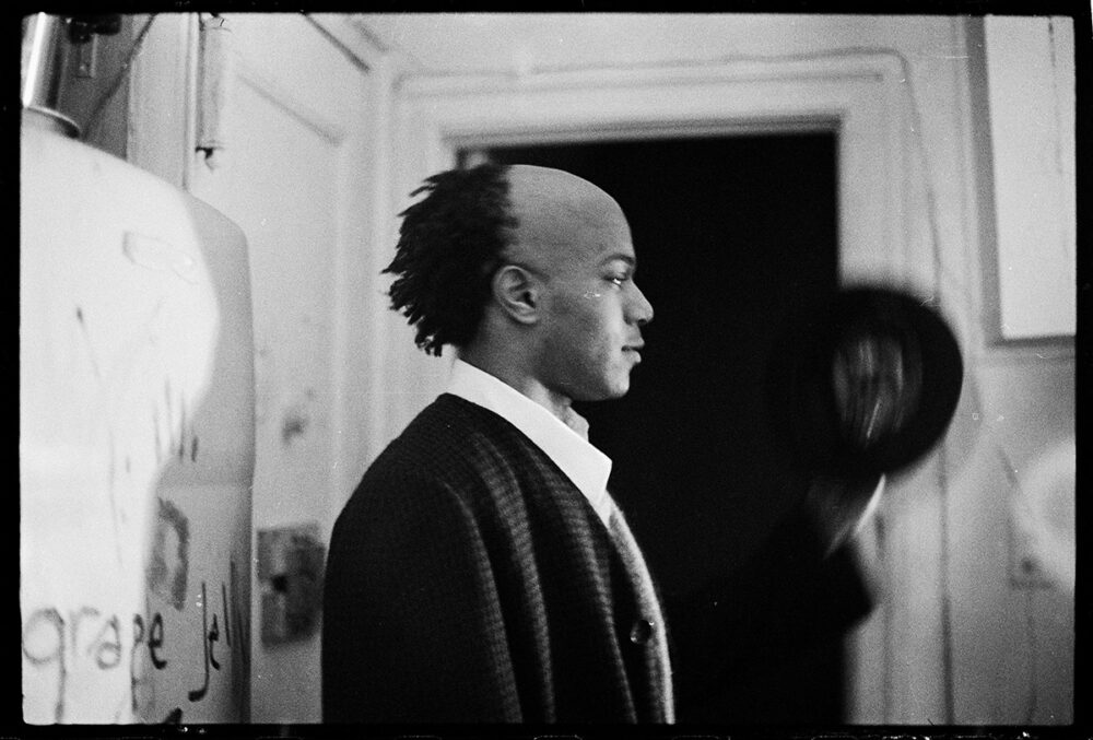 Basquiat in the apartment, 1980. Photo: Alexis Adler. 