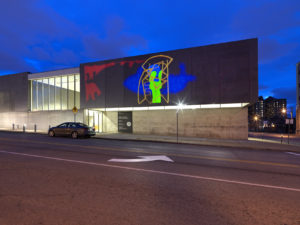 Installation view of Stanya Kahn's Friends in Low Places projected on the CAM facade