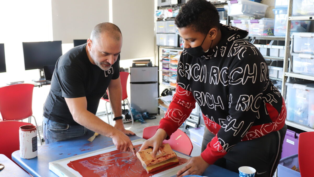 Resident Teaching Artist Blaine Deutsch working with a NAN student. Photo: CAM staff.