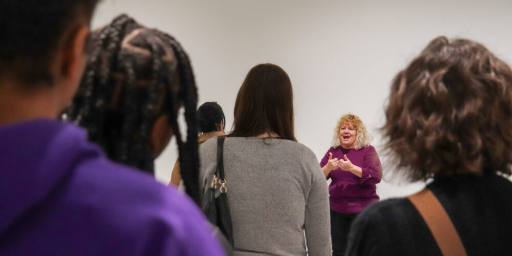 Angela Botz leads an ASL tour of Great Rivers Biennial 2024. Photo: CAM Staff.