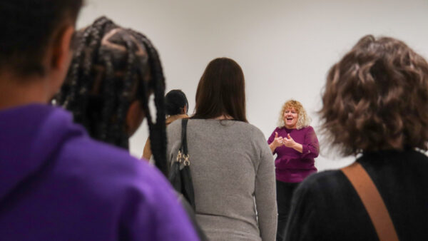 Angela Botz leads an ASL tour of Great Rivers Biennial 2024. Photo: CAM Staff.