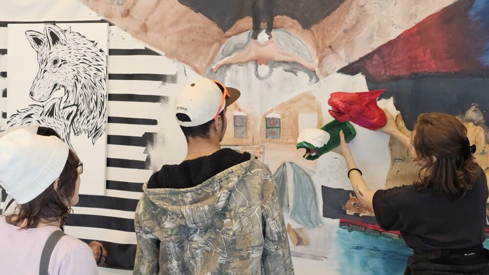 New Art in the Neighborhood participants work with Resident Teaching Artist Ahlam Khamis.
Photo: CAM staff.