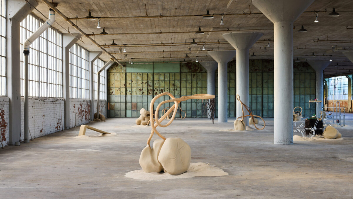 Blas Isasi, <i>1,001,532 CE </i>, 2024. Wood, steel, powder coat, modeling clay, hair extensions, polystyrene foam, unfired clay, spray paint, sand, water. Variable dimensions. Installation view, <i>Prospect.6: the future is present, the harbinger is home</i>, New Orleans, 2024. Photo: Alex Marks.