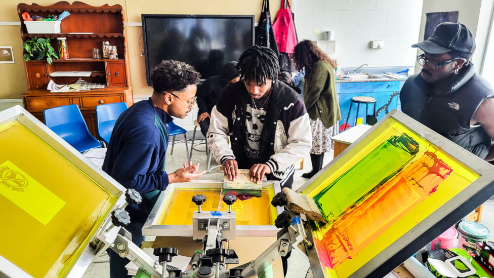 Christopher Loss, People’s Art and Recreation Center, with a student at Sumner High School.
Photo: CAM staff.